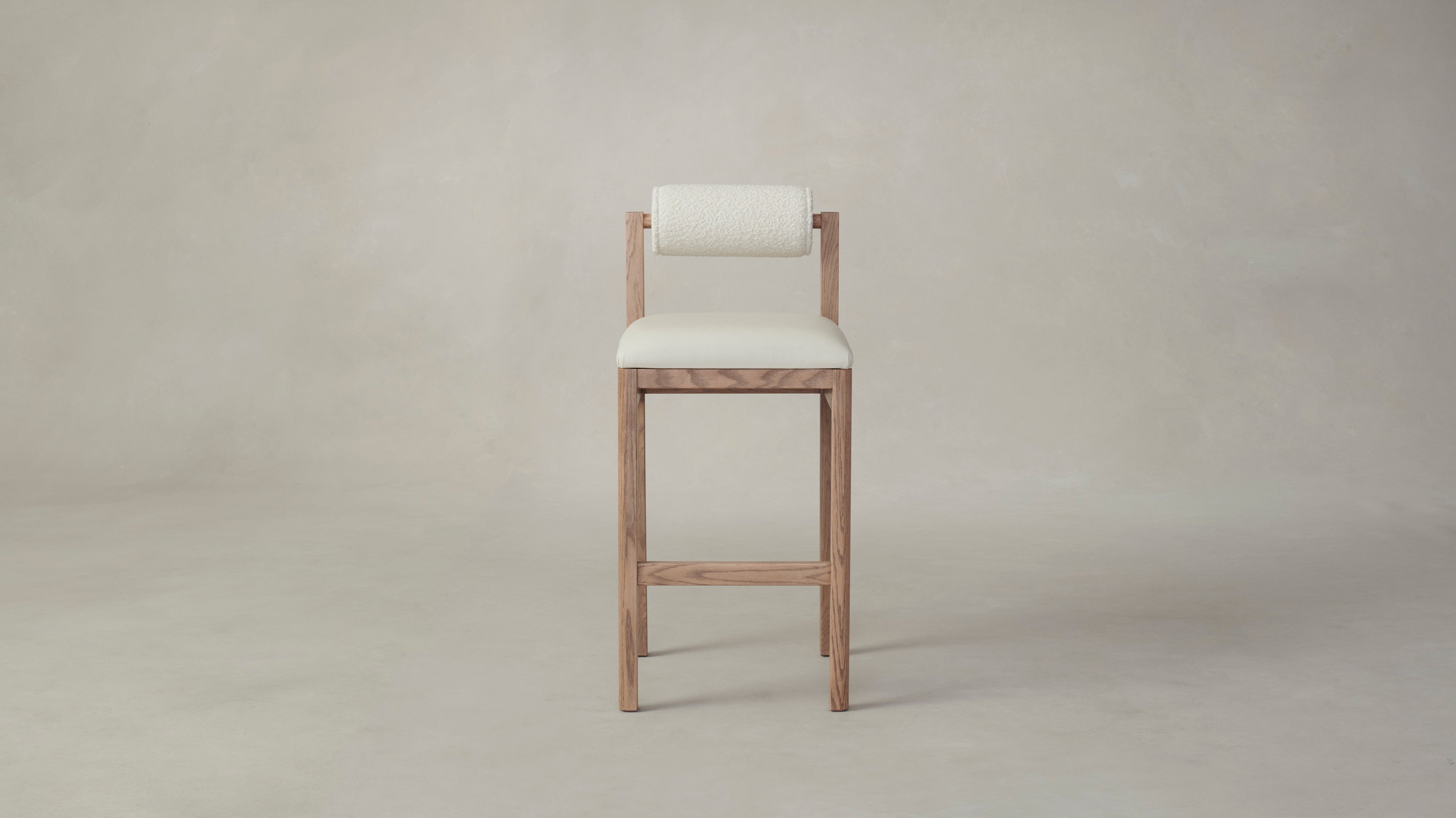 The Thayer  - Pebbled Leather Swan Seat Italian Bouclé White Bolster Bar and Counter Stool